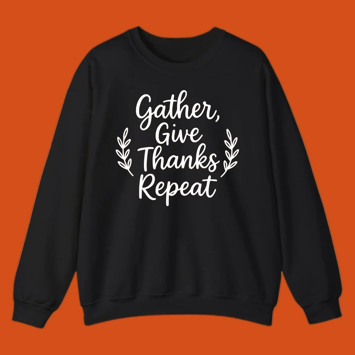 Thanksgiving gather repeat phrase in white typography with leaf accents.