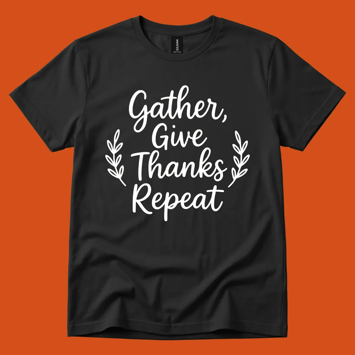 Thanksgiving gather repeat phrase in white typography with leaf accents.