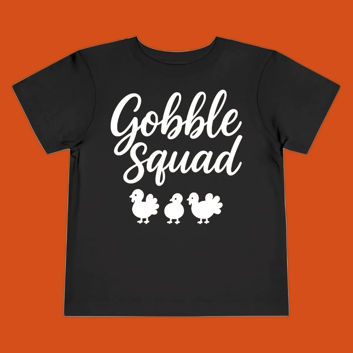 Gobble Squad Thanksgiving design with script text and cute turkey illustrations.