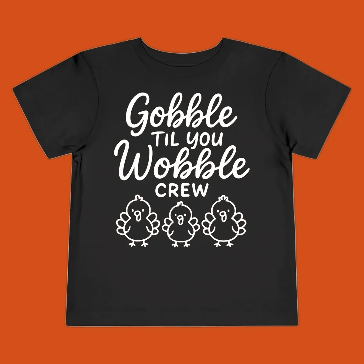 Gobble til you wobble crew thanksgiving design with three cartoon chicks.
