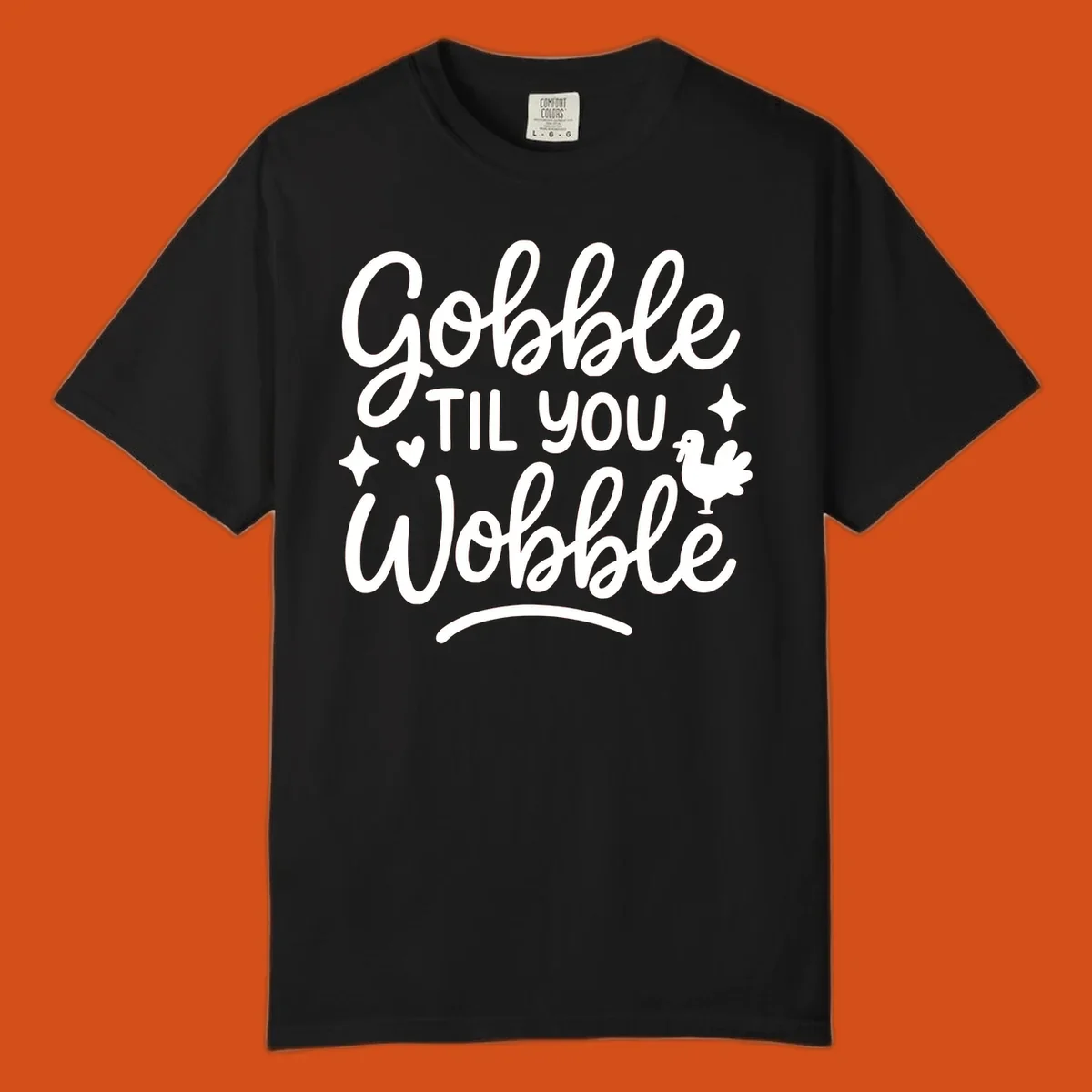 Gobble Til You Wobble Thanksgiving turkey graphic with fun lettering.