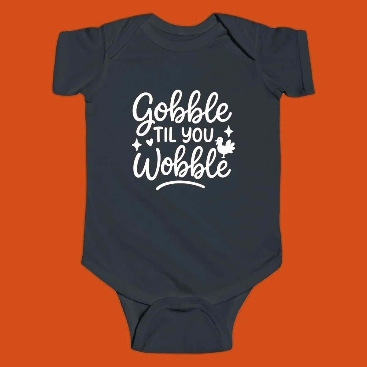 Gobble Til You Wobble Thanksgiving turkey graphic with fun lettering.