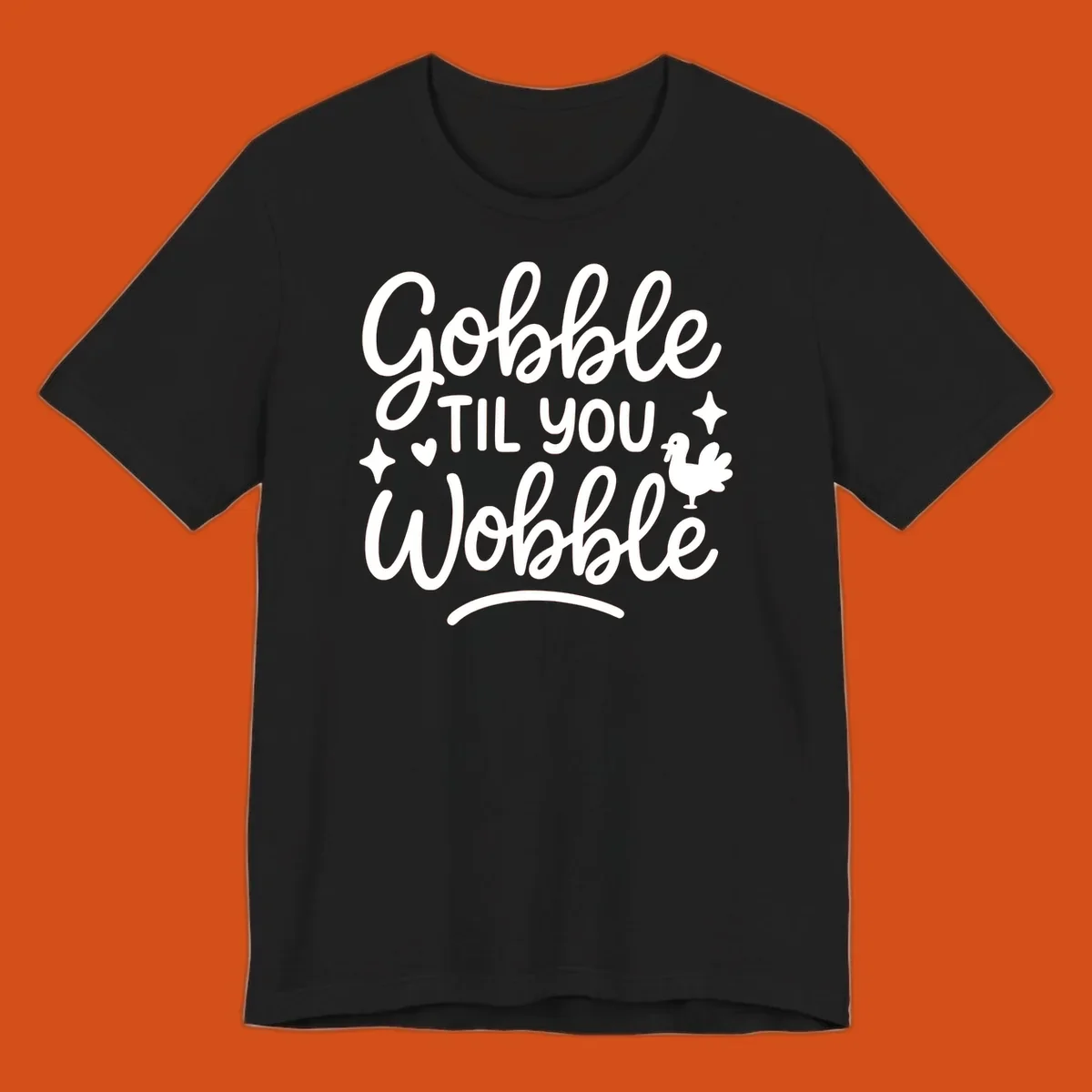 Gobble Til You Wobble Thanksgiving turkey graphic with fun lettering.