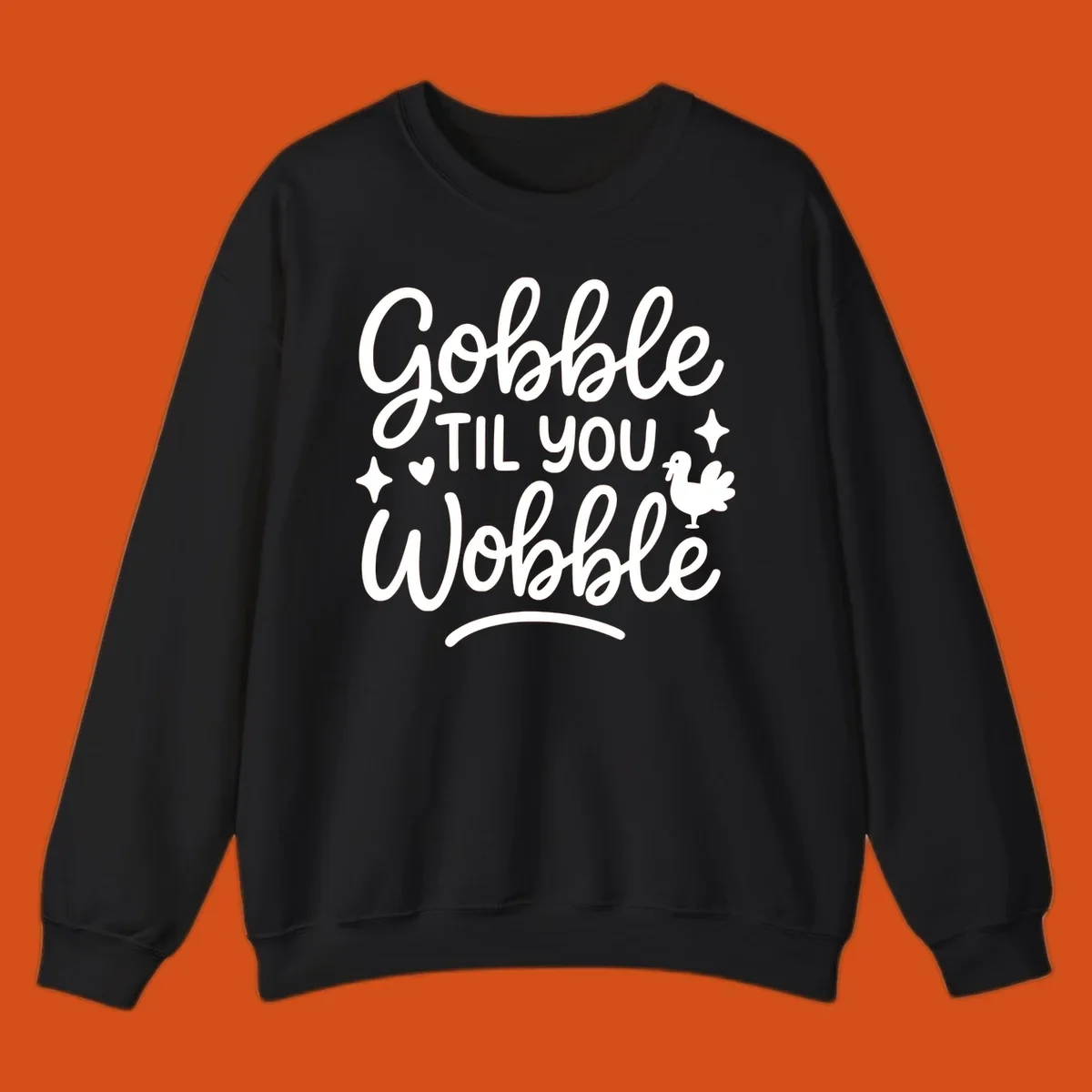 Gobble Til You Wobble Thanksgiving turkey graphic with fun lettering.
