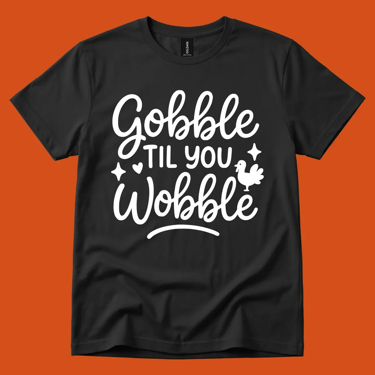 Gobble Til You Wobble Thanksgiving turkey graphic with fun lettering.