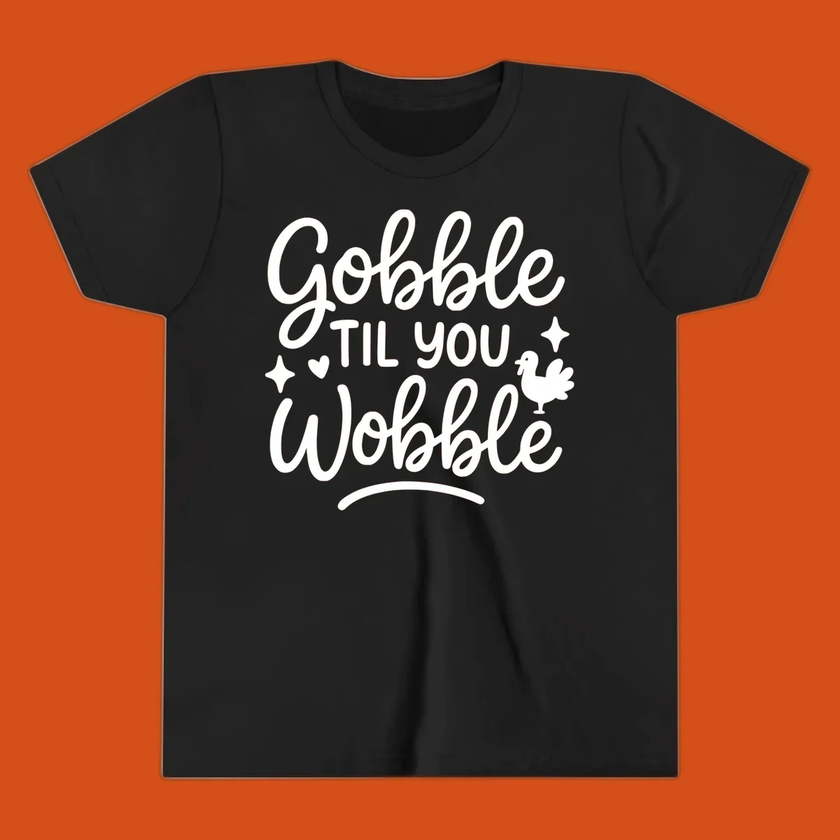 Gobble Til You Wobble Thanksgiving turkey graphic with fun lettering.