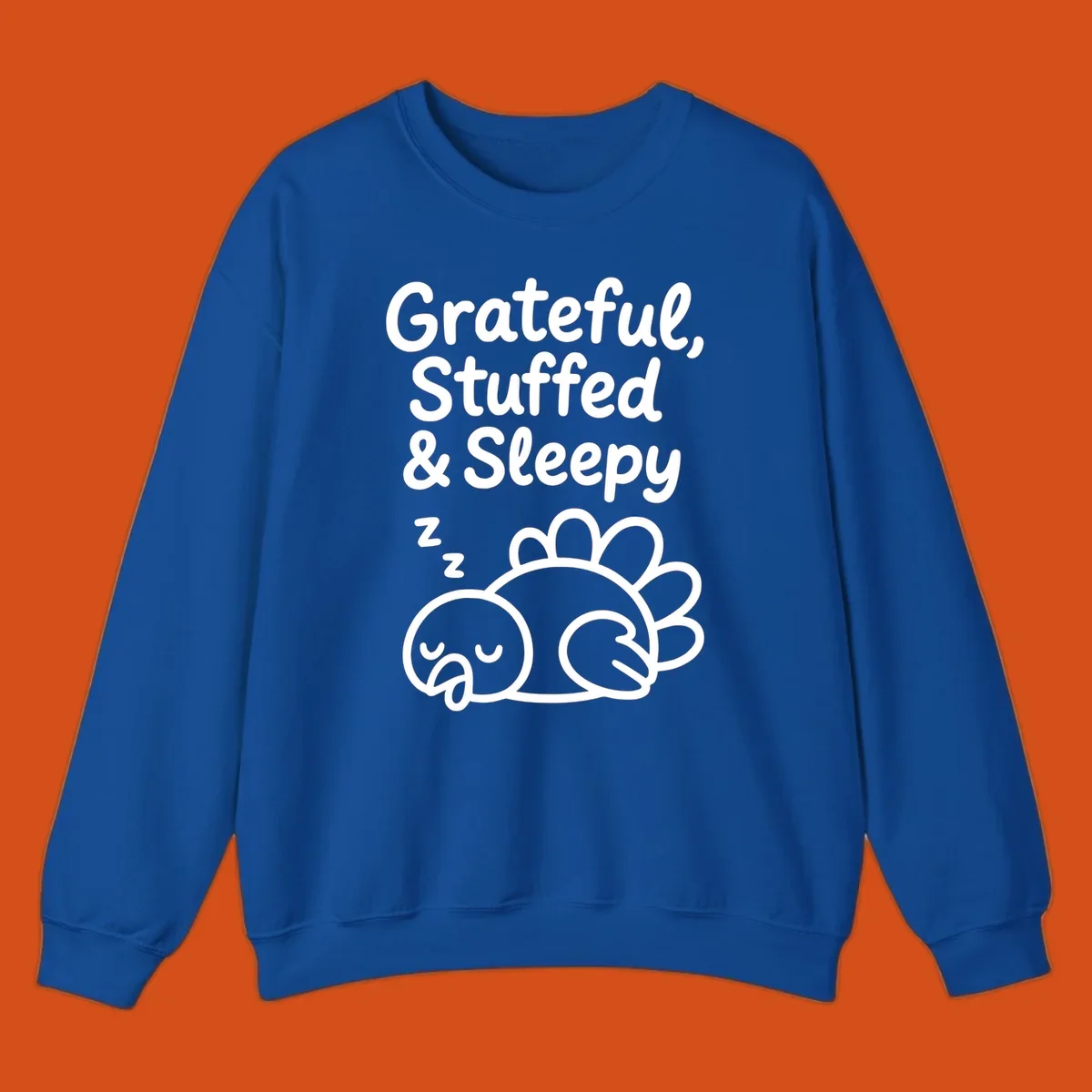 Grateful, Stuffed & Sleepy text with a sleeping turkey, representing the thanksgiving-food-coma.