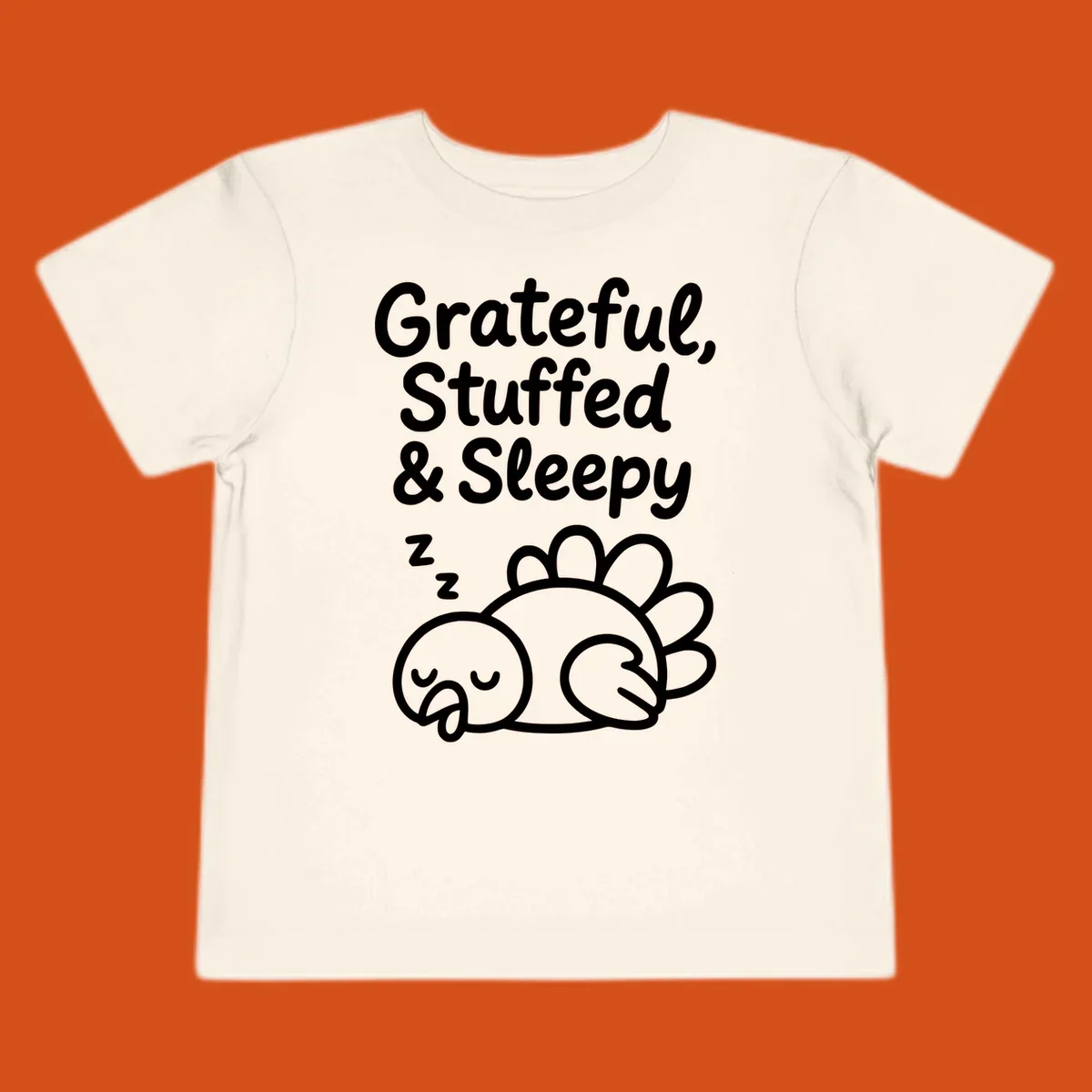 Grateful, Stuffed & Sleepy text with a sleeping turkey, representing the thanksgiving-food-coma.