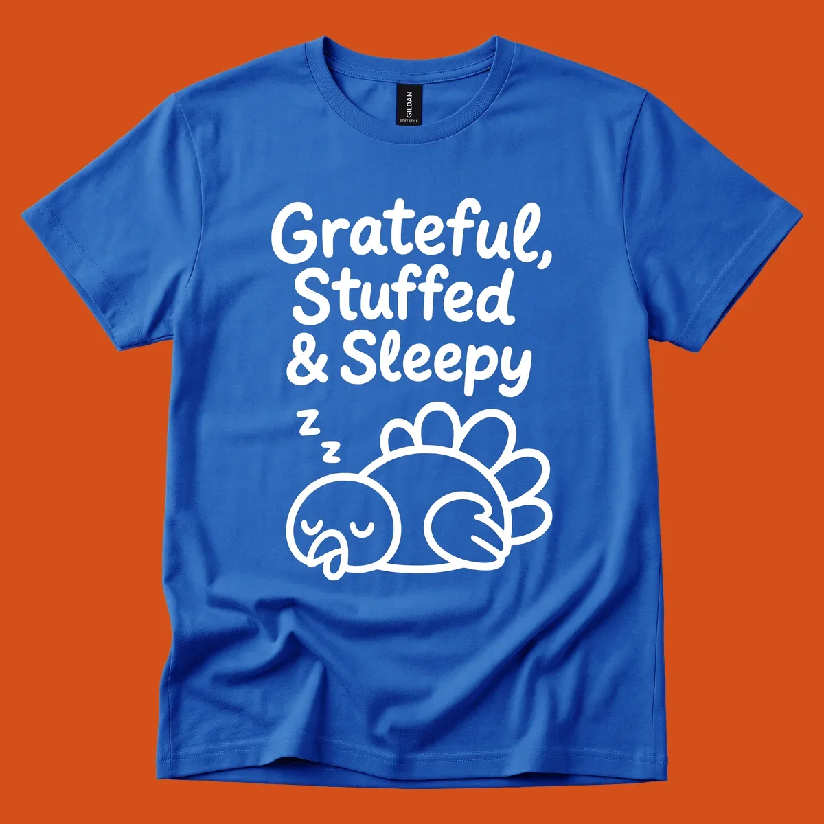 Grateful, Stuffed & Sleepy text with a sleeping turkey, representing the thanksgiving-food-coma.