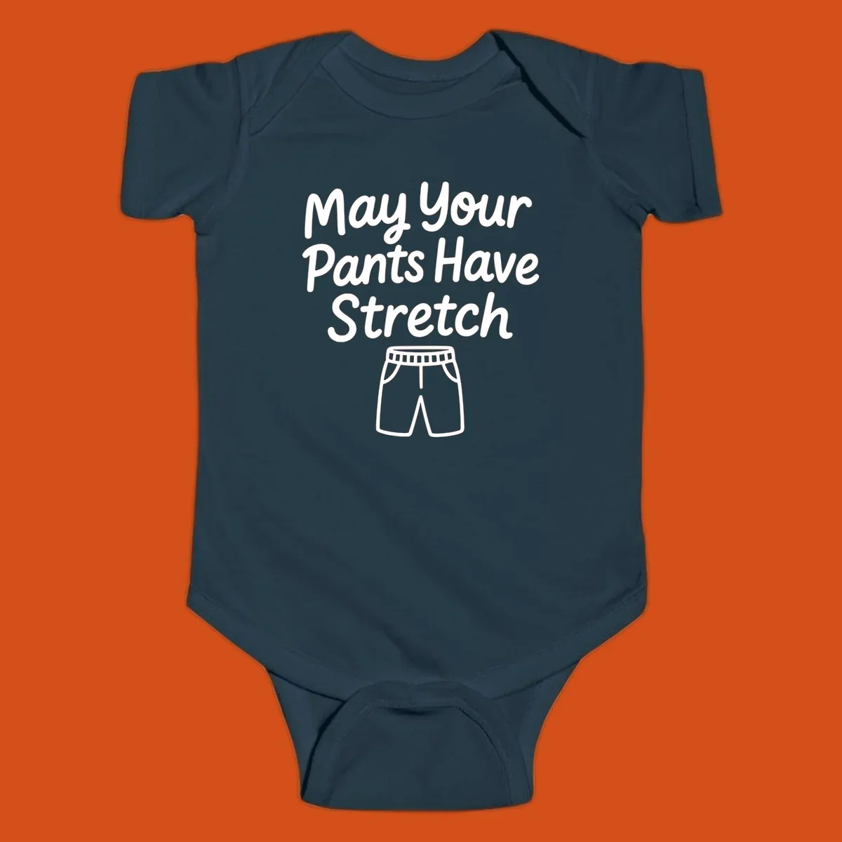 May Your Pants Have Stretch text and shorts illustration on black background.
