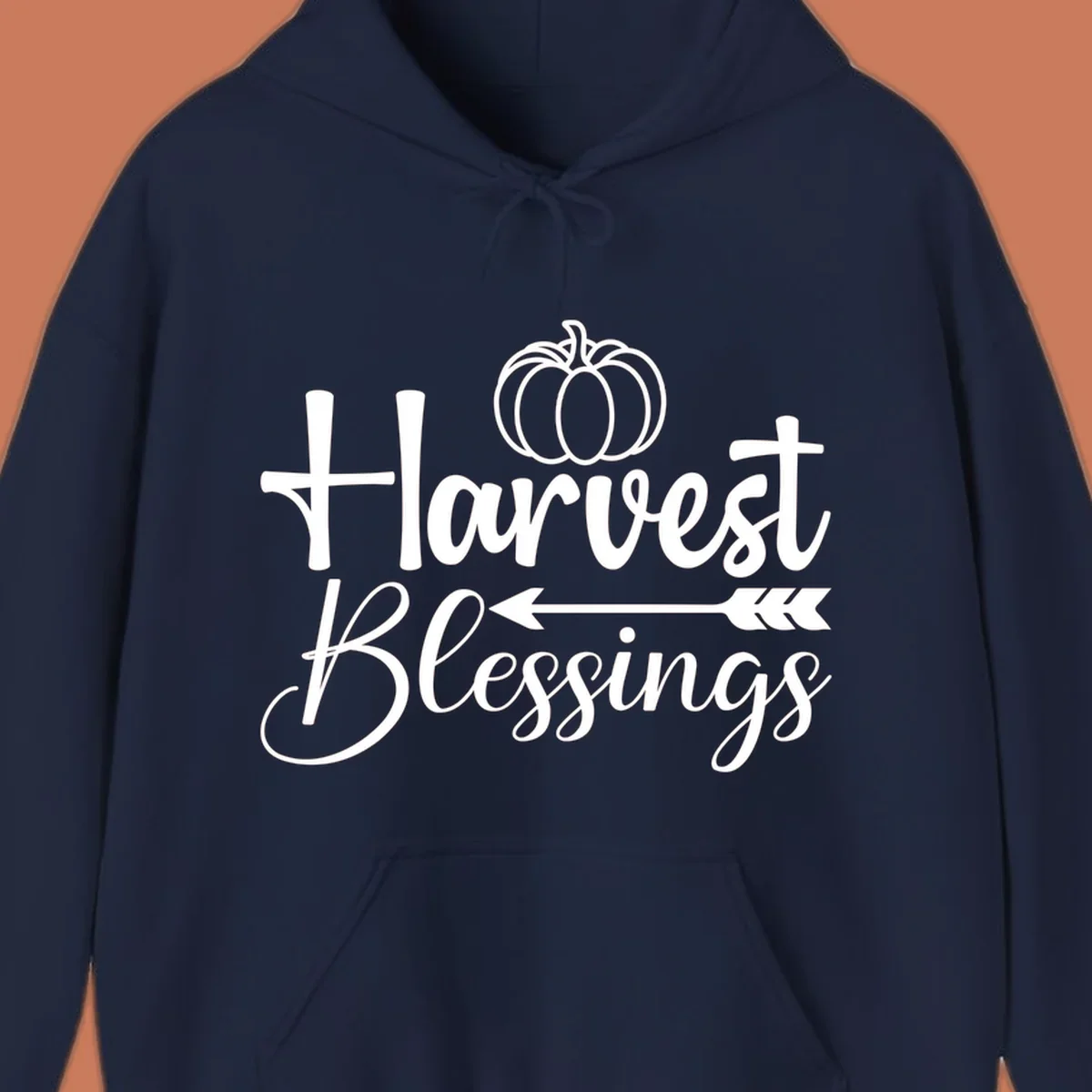 Harvest Blessings text with pumpkin and arrow illustration for autumn season.