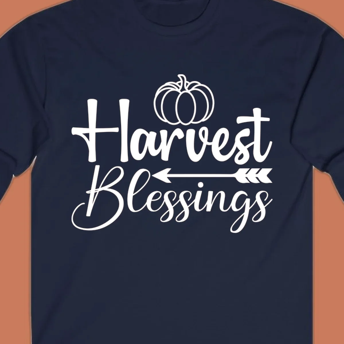 Harvest Blessings text with pumpkin and arrow illustration for autumn season.