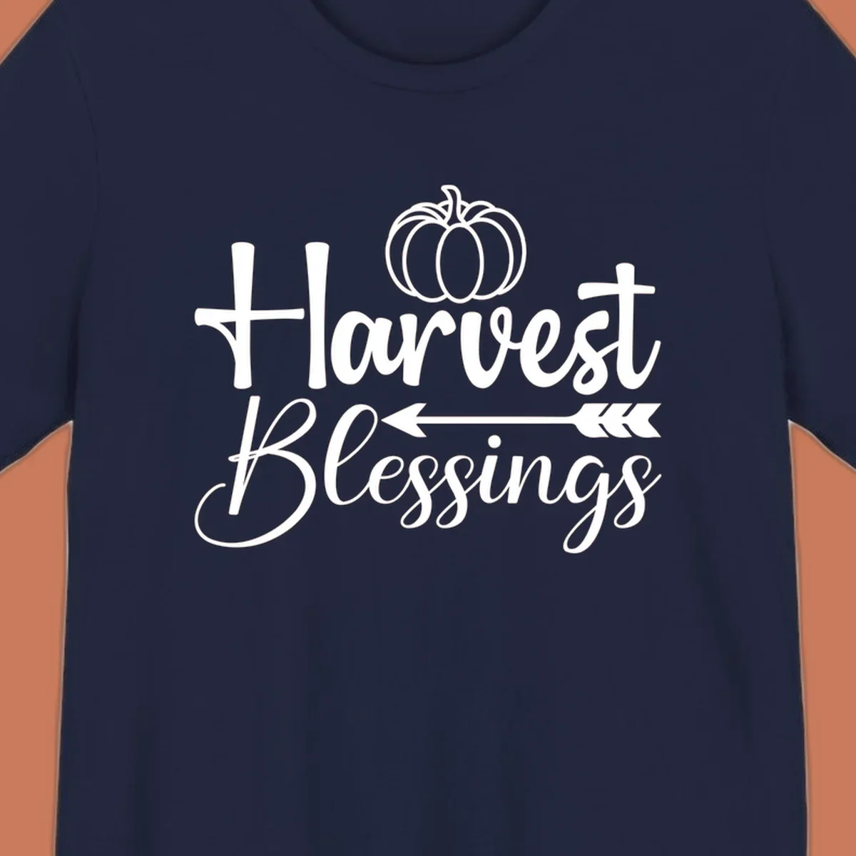 Harvest Blessings text with pumpkin and arrow illustration for autumn season.