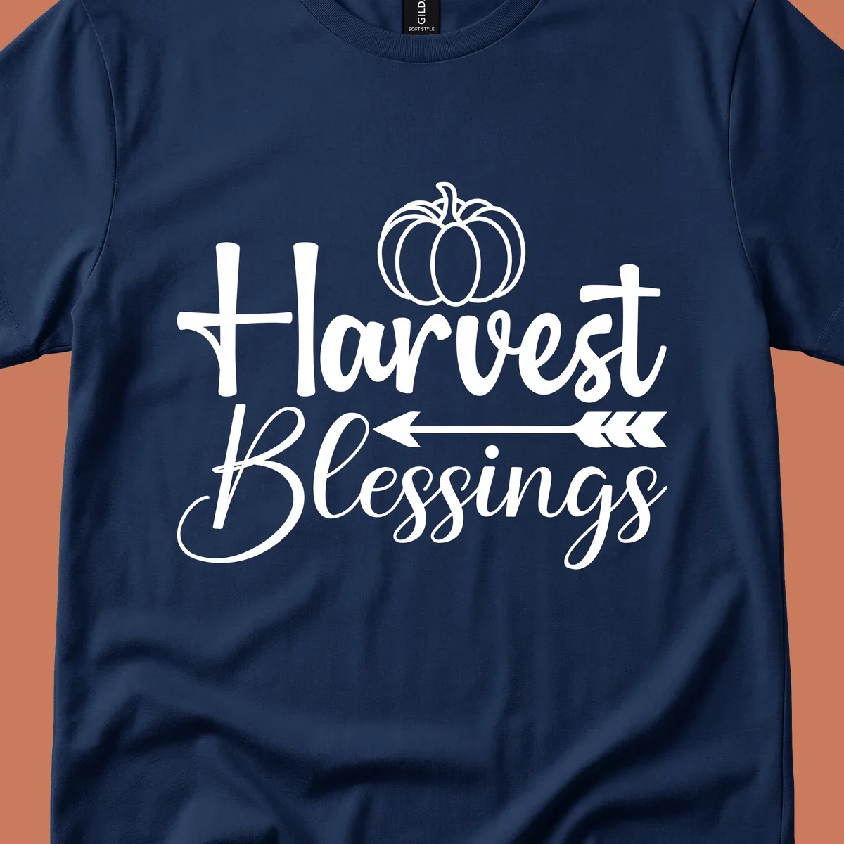 Harvest Blessings text with pumpkin and arrow illustration for autumn season.