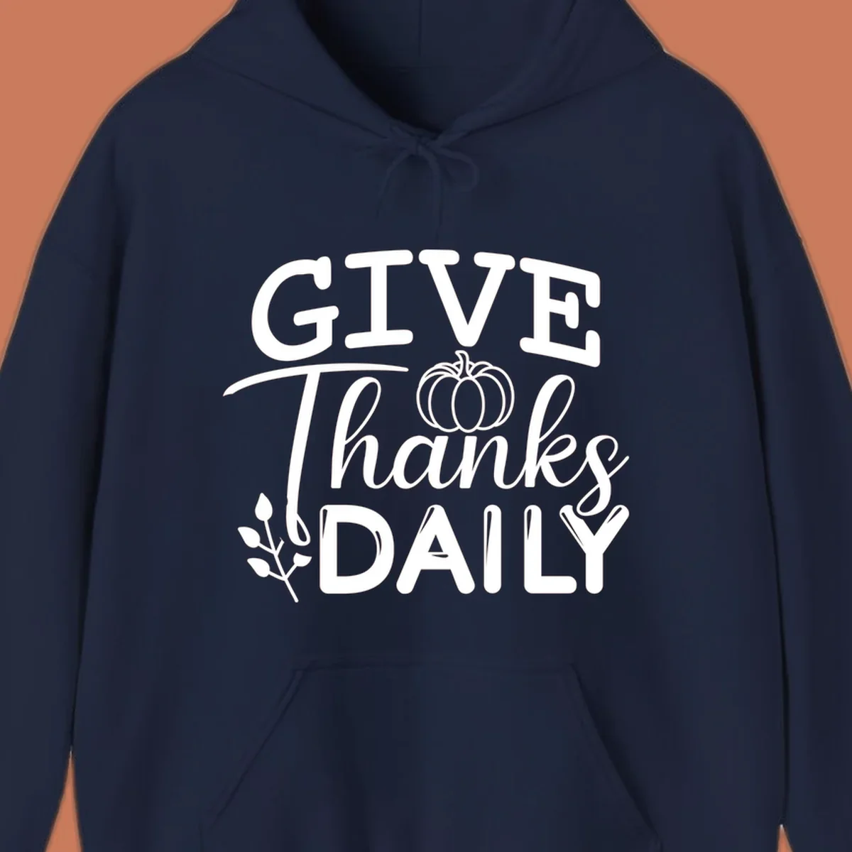 Give Thanks Daily text with a pumpkin and leaf sprig.