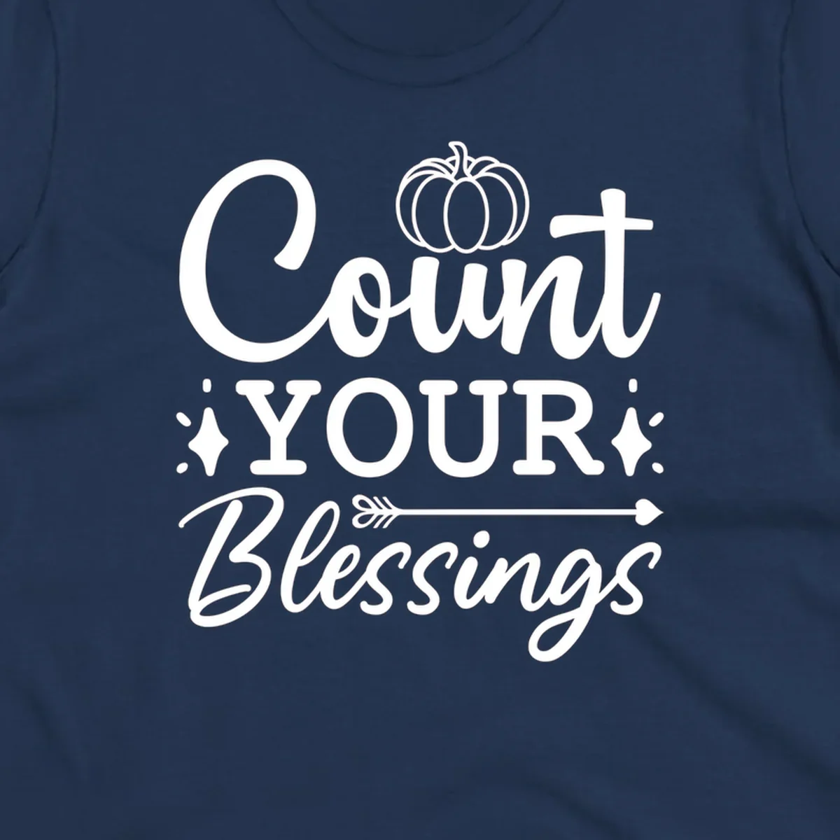 Count your blessings text with pumpkin and arrow graphic, in white.