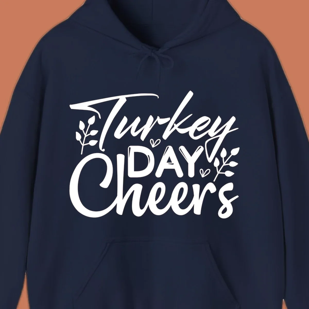 Typography design with "Turkey DAY Cheers" and decorative leaves, a Thanksgiving sentiment.