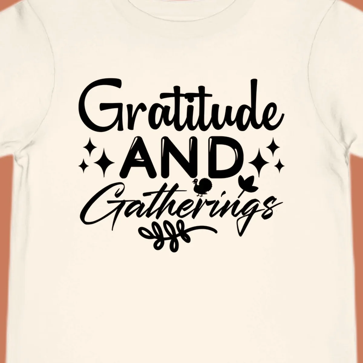 Gratitude and Gatherings text with star, turkey, and leaf elements. gratitude-gatherings.
