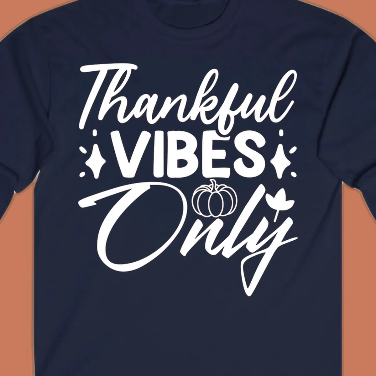 Thankful Vibes Only graphic with pumpkin and flower, white text on black.