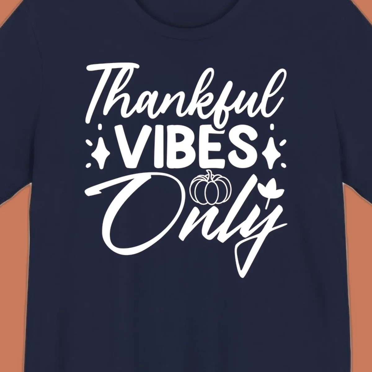 Thankful Vibes Only graphic with pumpkin and flower, white text on black.