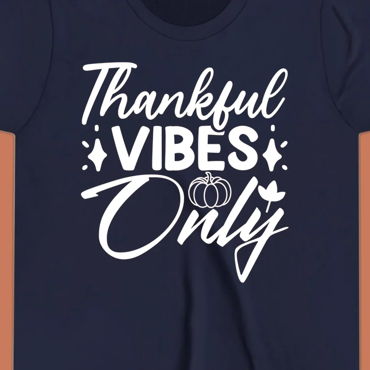 Thankful Vibes Only graphic with pumpkin and flower, white text on black.
