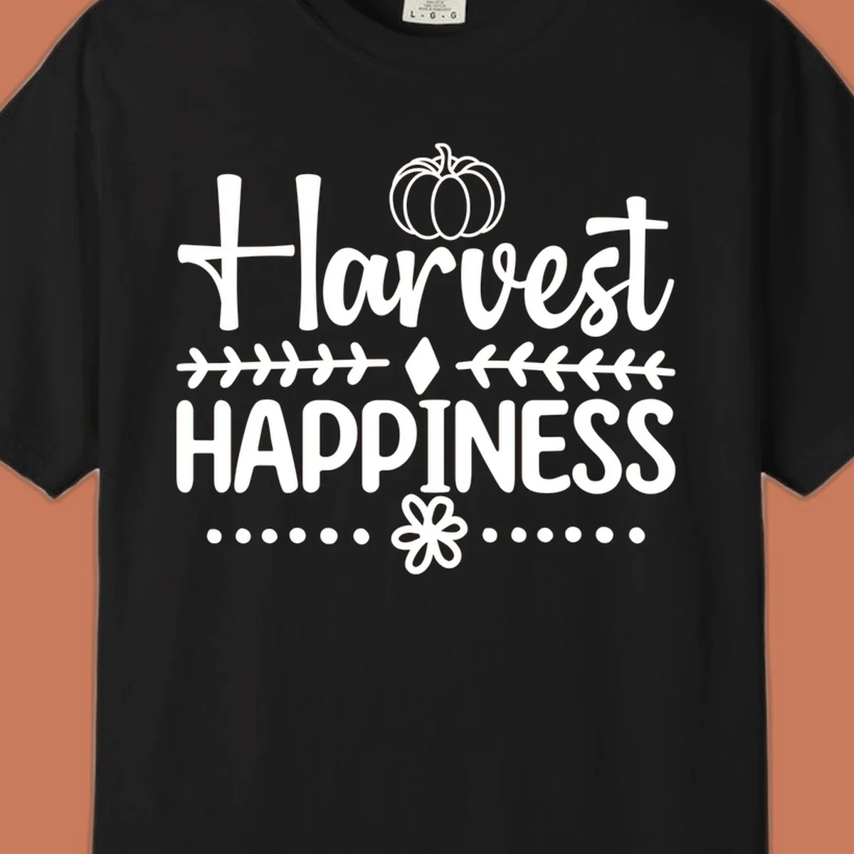Harvest Happiness autumn sentiment design with pumpkin and floral accents.
