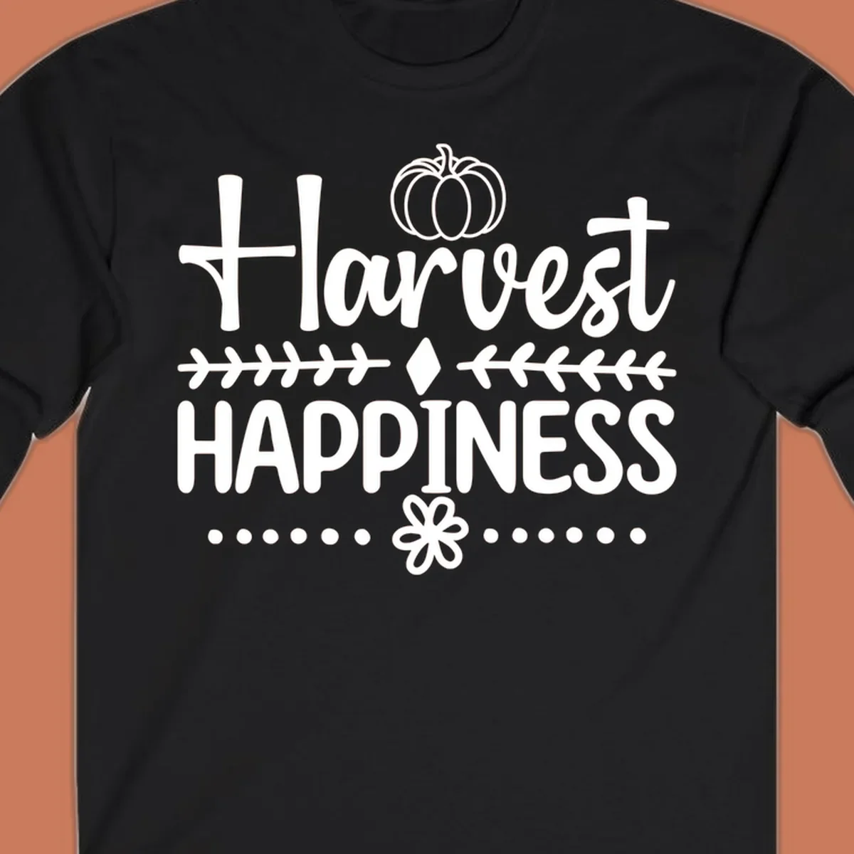 Harvest Happiness autumn sentiment design with pumpkin and floral accents.