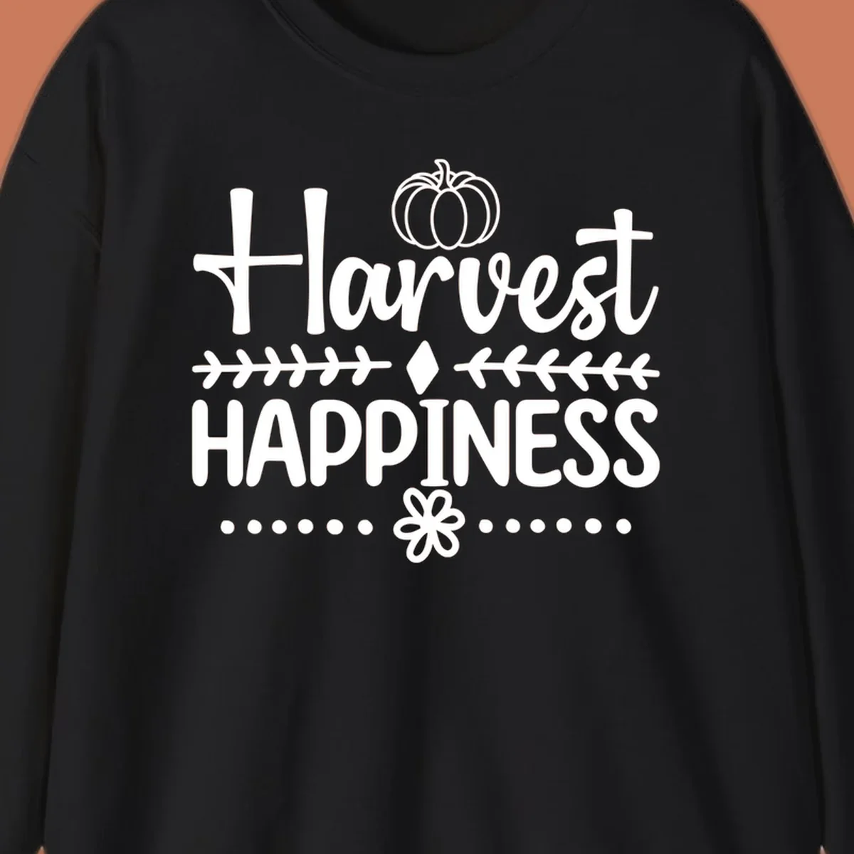 Harvest Happiness autumn sentiment design with pumpkin and floral accents.