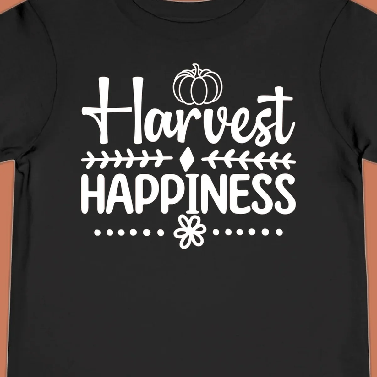 Harvest Happiness autumn sentiment design with pumpkin and floral accents.