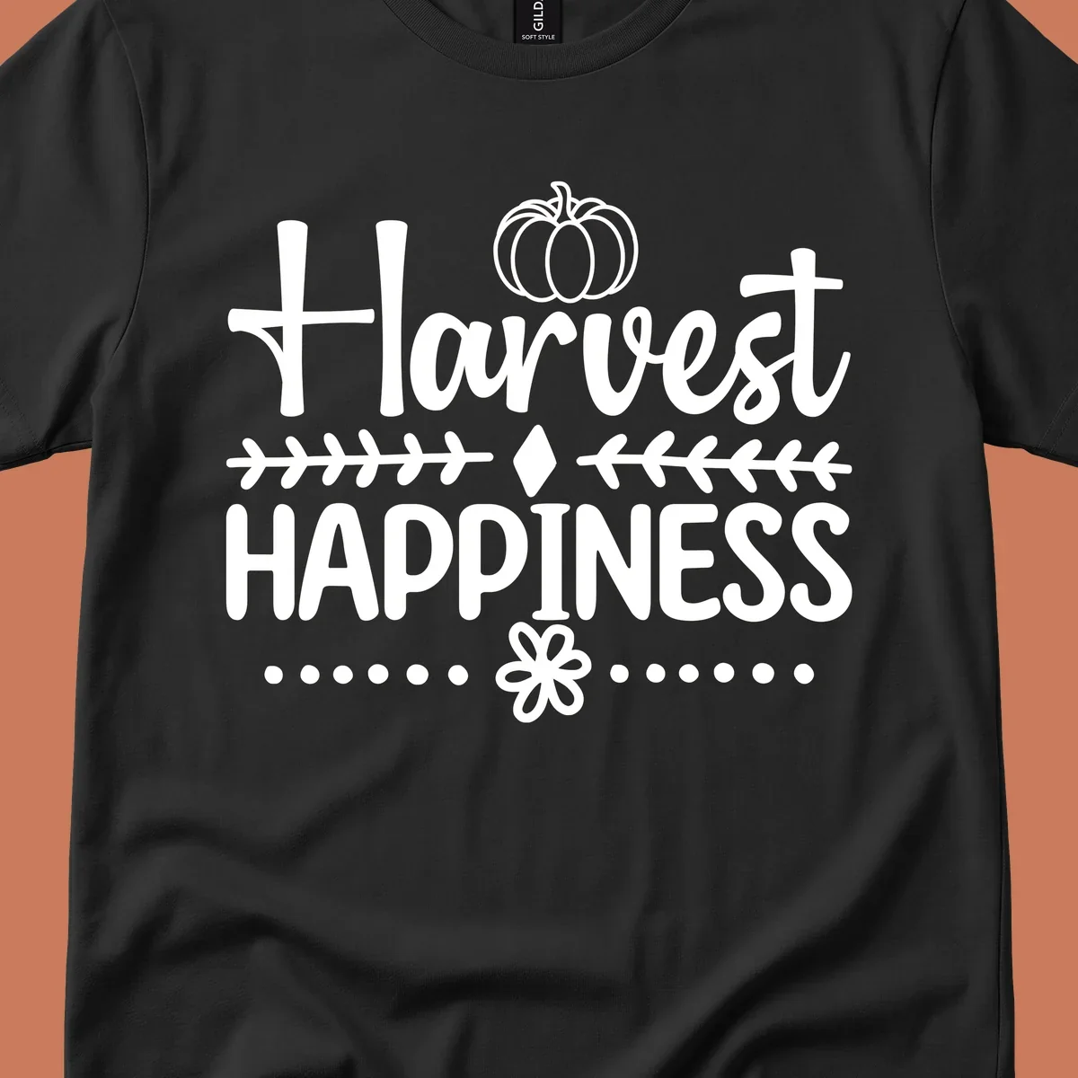Harvest Happiness autumn sentiment design with pumpkin and floral accents.