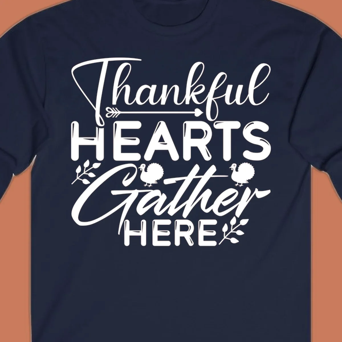 Thankful Hearts Gather Here text with turkeys and leaves for Thanksgiving. 