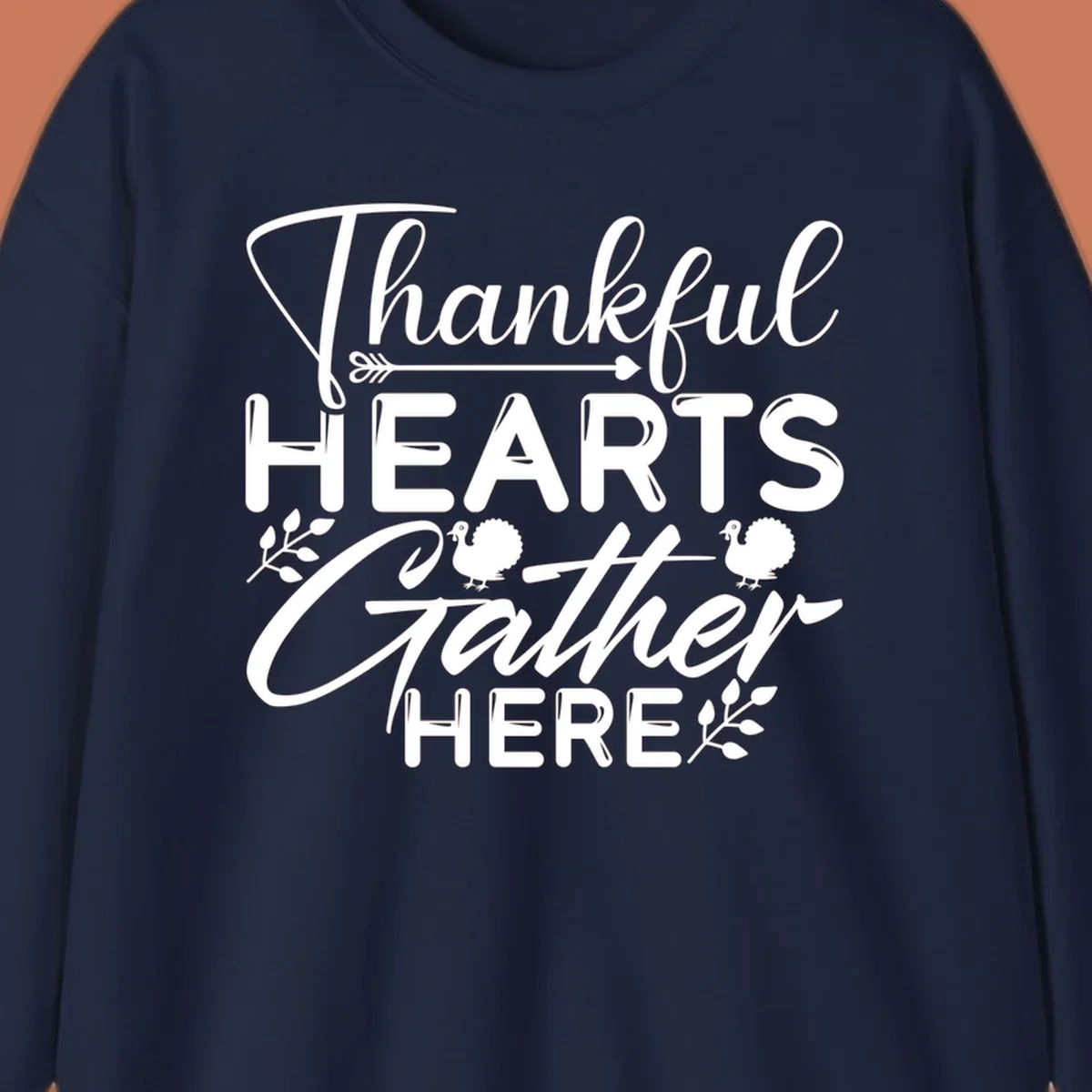 Thankful Hearts Gather Here text with turkeys and leaves for Thanksgiving. 