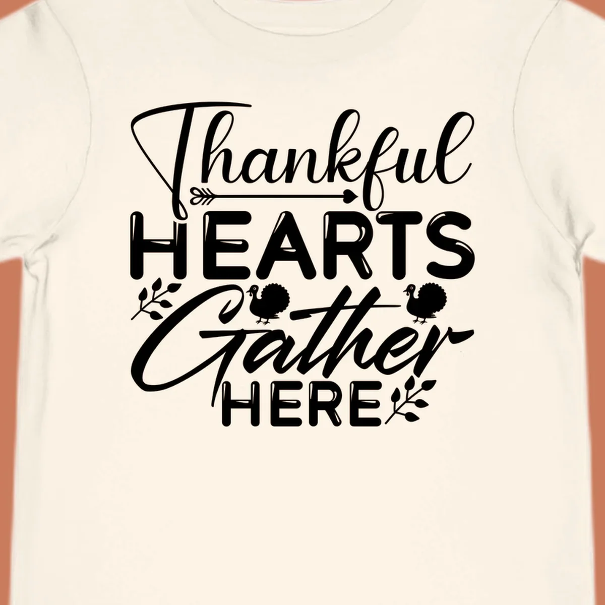 Thankful Hearts Gather Here text with turkeys and leaves for Thanksgiving. 