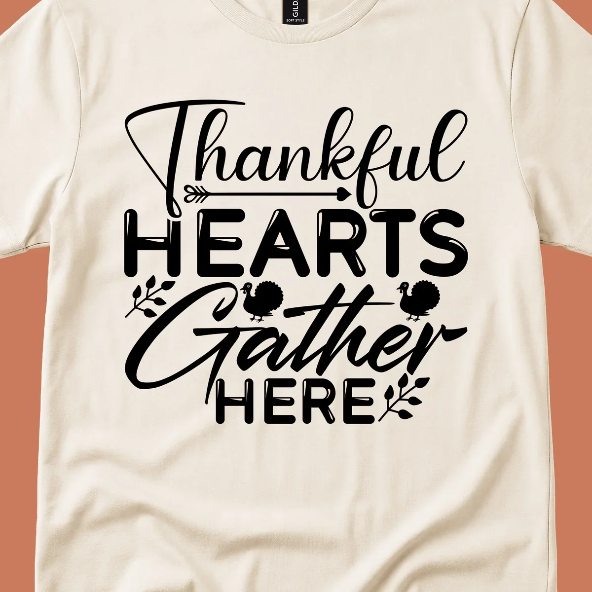 Thankful Hearts Gather Here text with turkeys and leaves for Thanksgiving. 