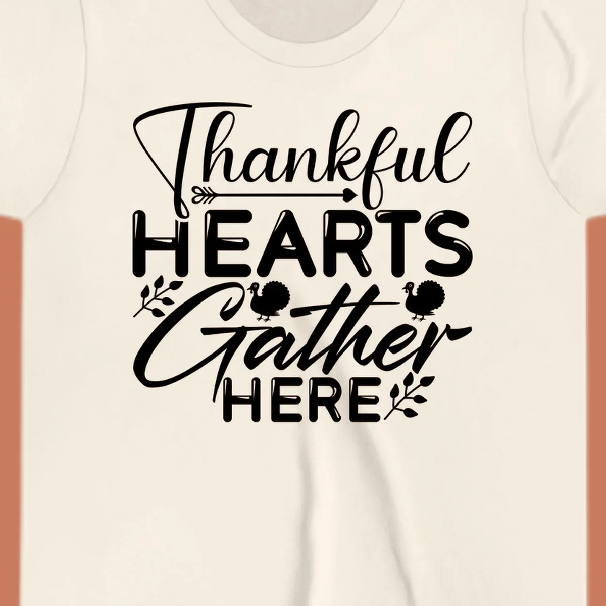 Thankful Hearts Gather Here text with turkeys and leaves for Thanksgiving. 