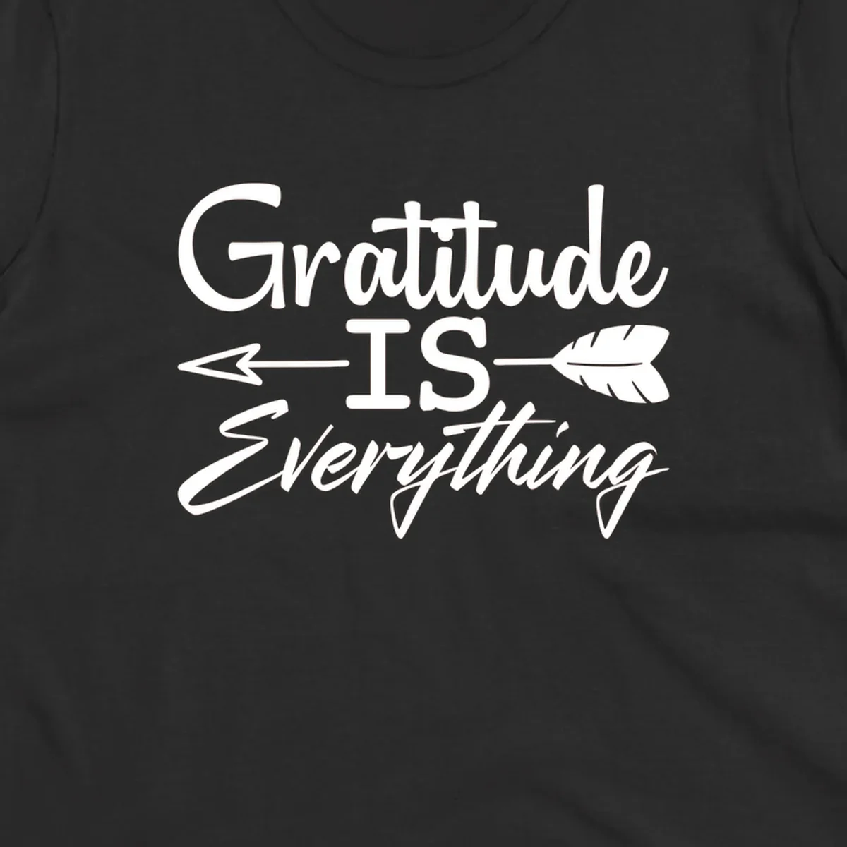 Gratitude Is Everything typography design with an arrow and feather graphic.