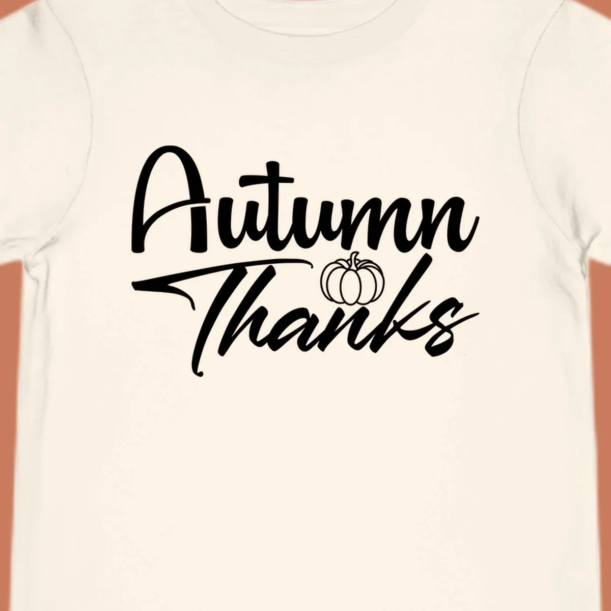 Autumn Thanks script text with a pumpkin illustration, autumn-thanks-pumpkin design.