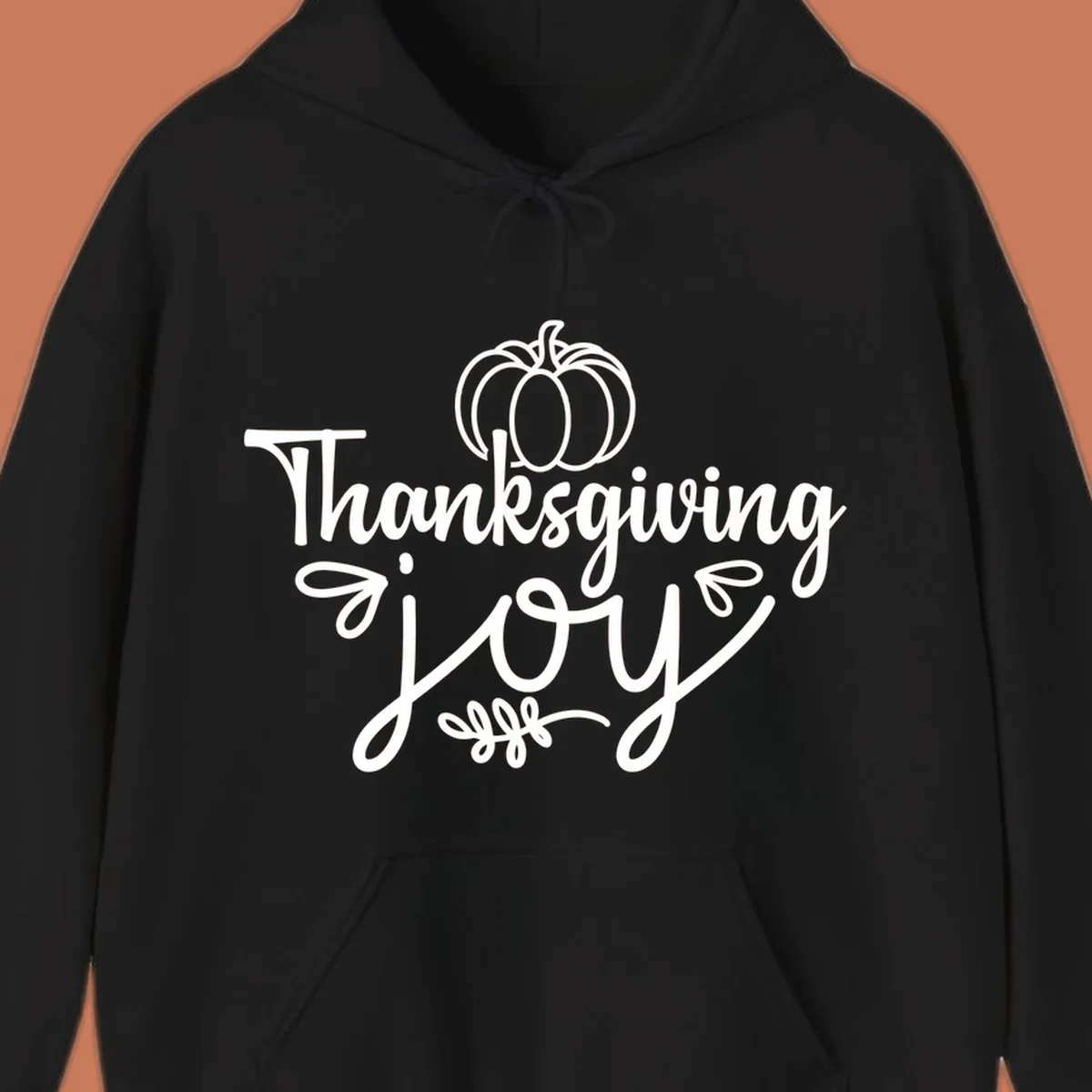 Thanksgiving Joy script text with a pumpkin illustration, for gratitude tees.