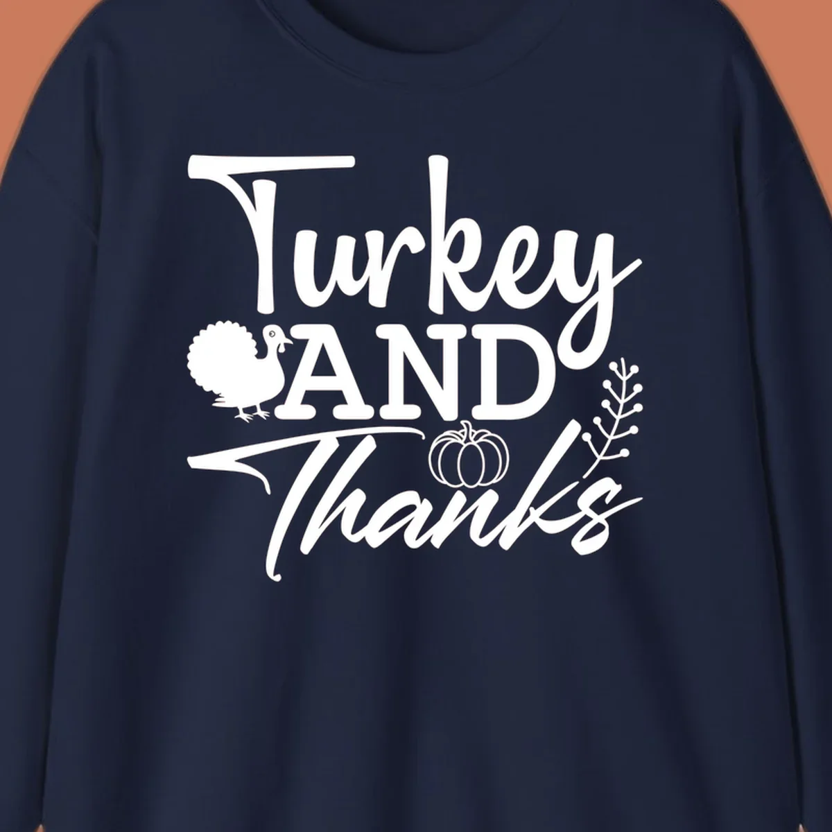 Thanksgiving turkey and thanks sentiment graphic with turkey, pumpkin, and leafy branch illustrations.