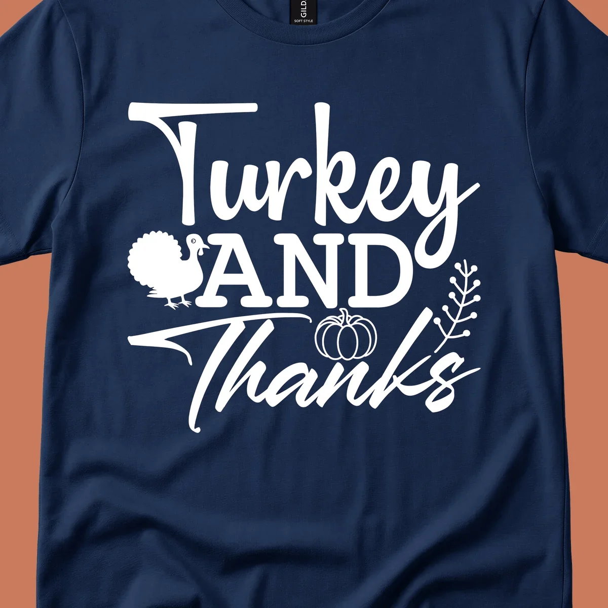Thanksgiving turkey and thanks sentiment graphic with turkey, pumpkin, and leafy branch illustrations.