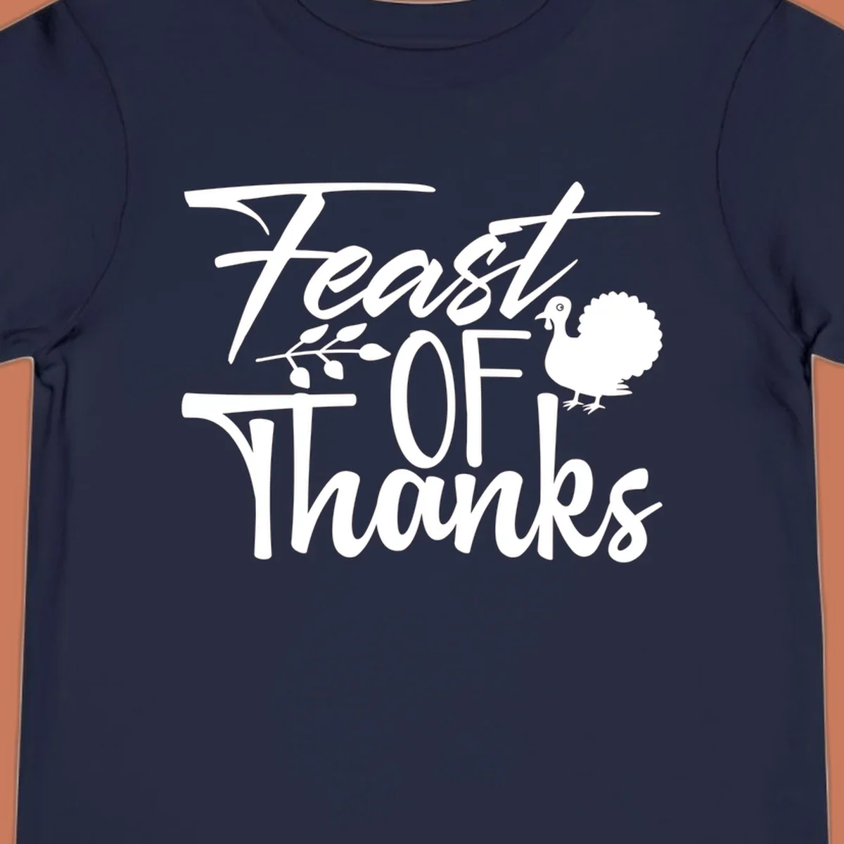Feast Of Thanks typography design with a turkey illustration.