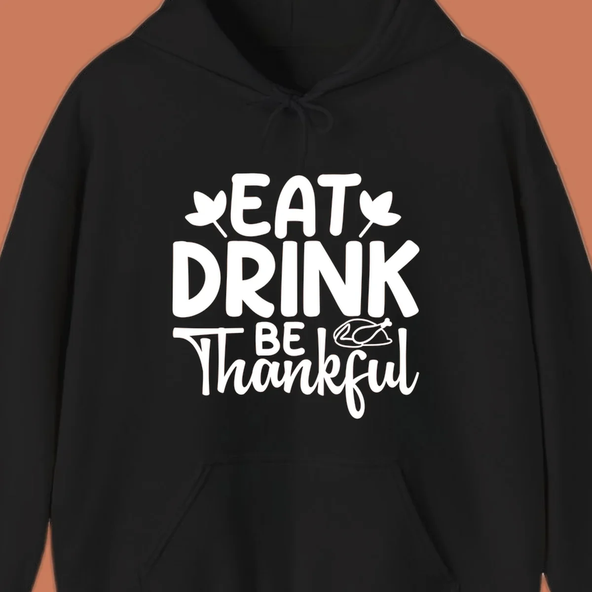 Eat Drink Be Thankful text with autumn leaves and a roasted chicken graphic.