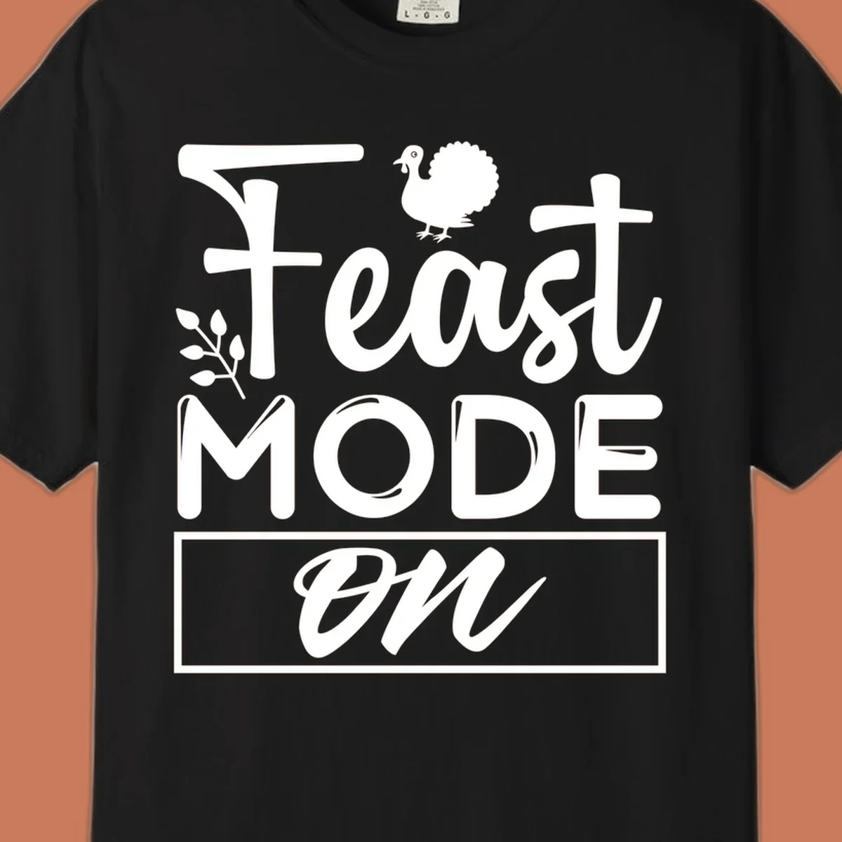 Feast Mode On text with a turkey illustration, Thanksgiving graphic tee design.