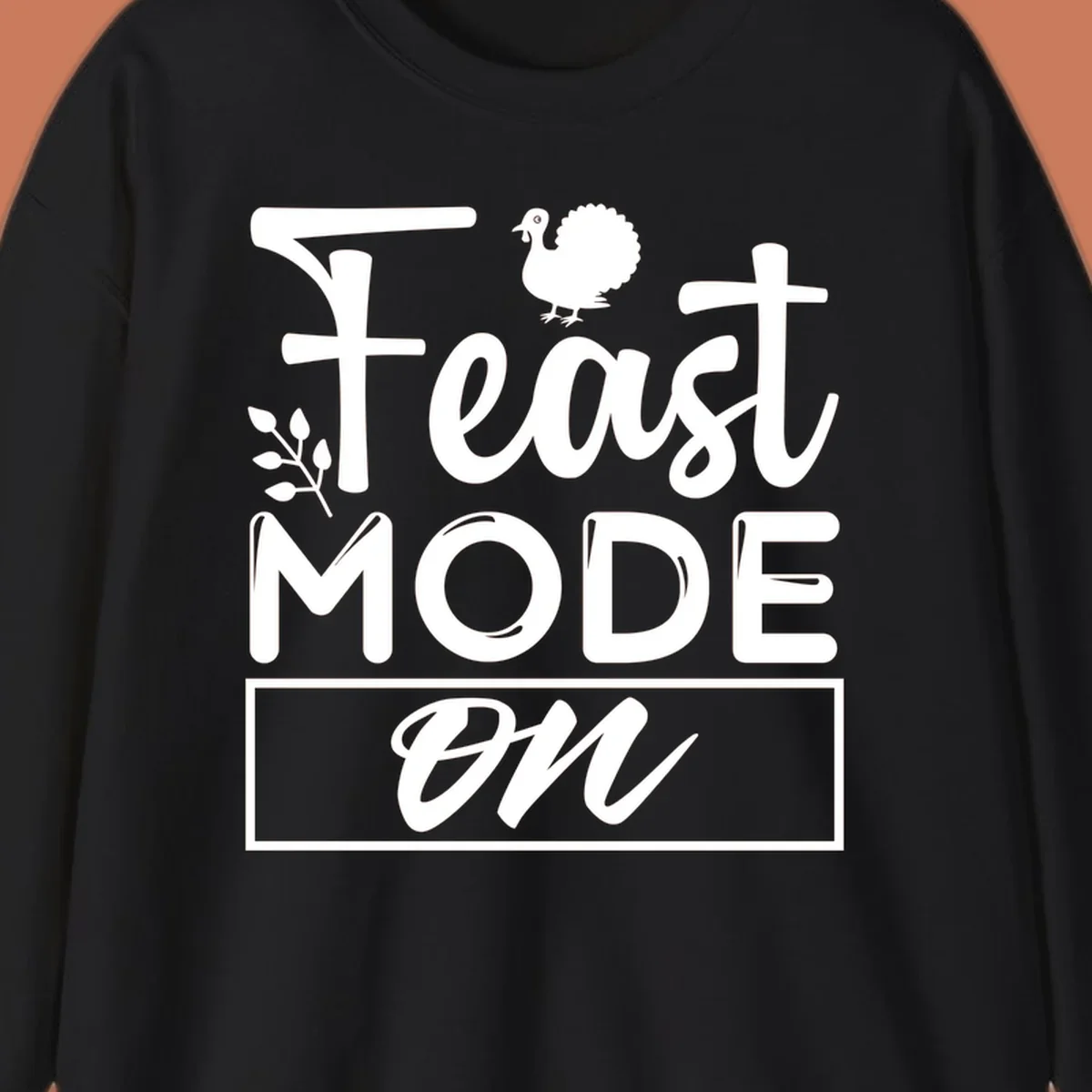 Feast Mode On text with a turkey illustration, Thanksgiving graphic tee design.