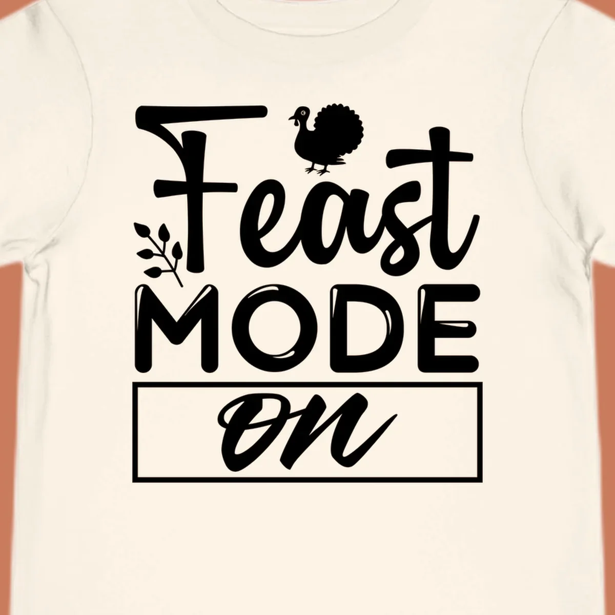 Feast Mode On text with a turkey illustration, Thanksgiving graphic tee design.