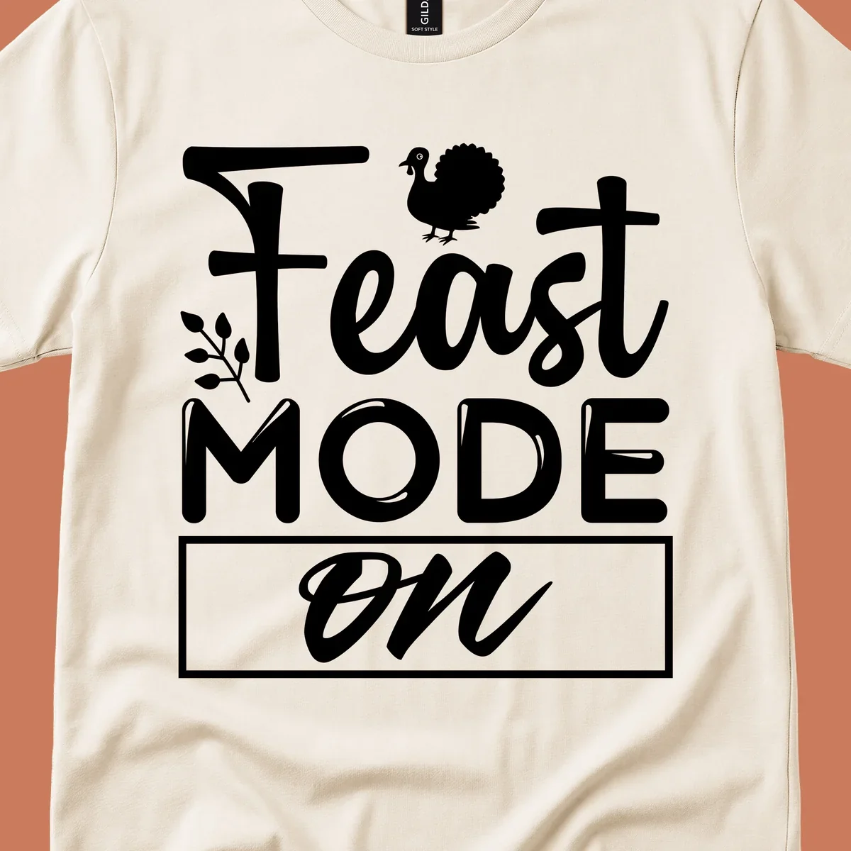 Feast Mode On text with a turkey illustration, Thanksgiving graphic tee design.
