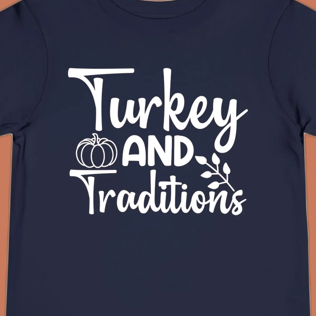 Thanksgiving traditions text and illustrations with pumpkin and leaves.