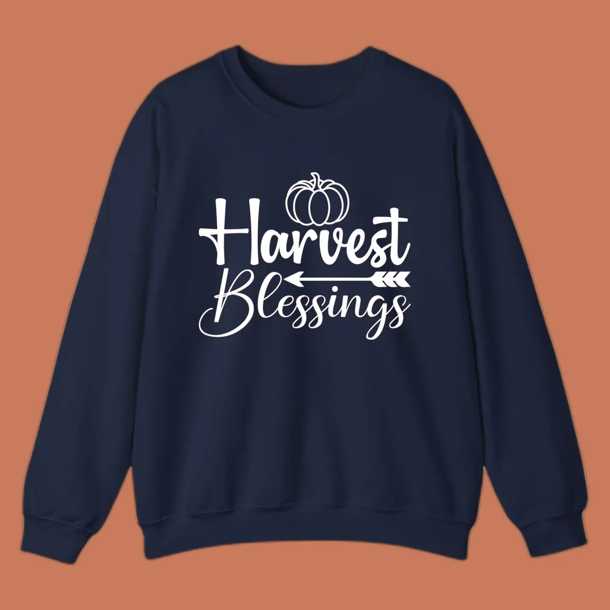 Harvest Blessings text with pumpkin and arrow illustration for autumn season.