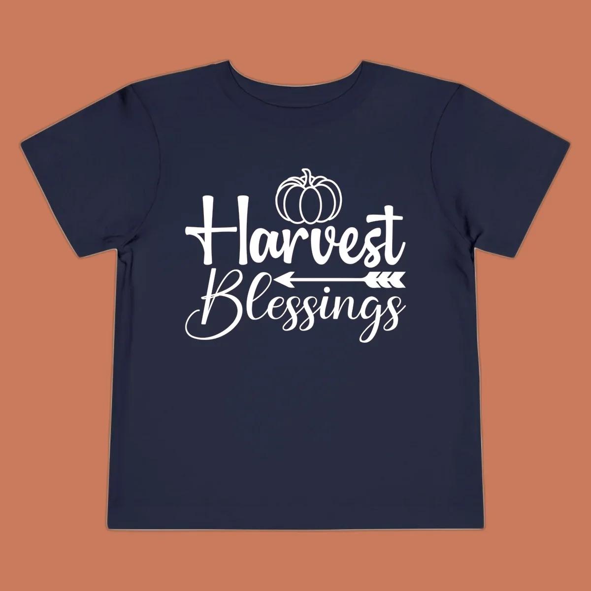 Harvest Blessings text with pumpkin and arrow illustration for autumn season.
