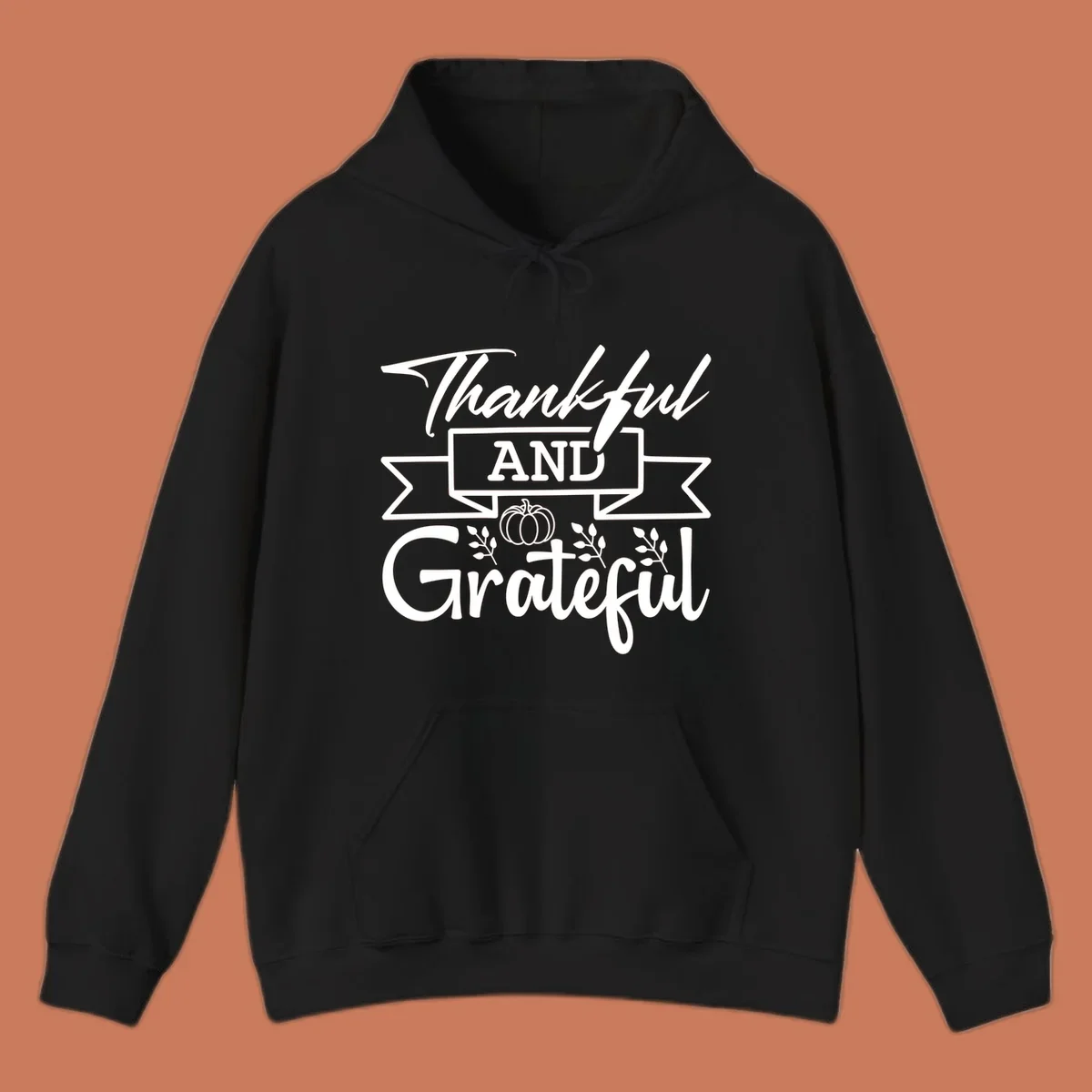 Thankful and Grateful autumn design with pumpkin and leaves.